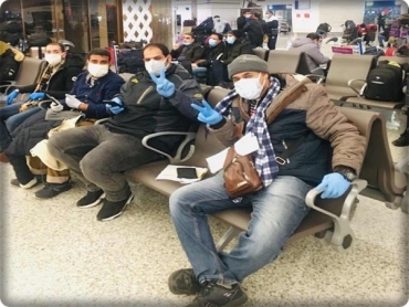 إيقاف مصريين إثنين في مطار ووهان الصينية